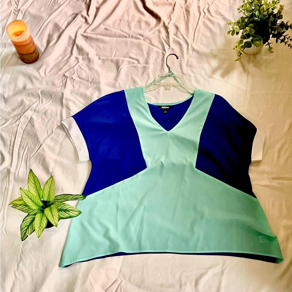 Multicolored avant-garde teal, blue ,and white blouse